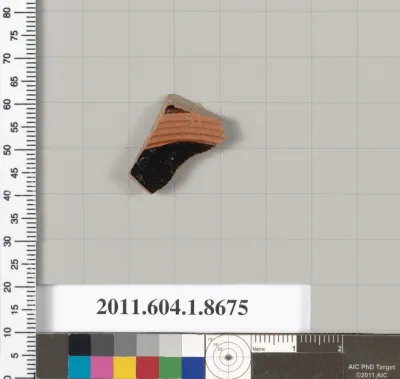 Terracotta fragment of a stemless kylix (drinking cup)