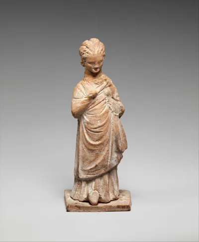 Terracotta statuette of a standing girl