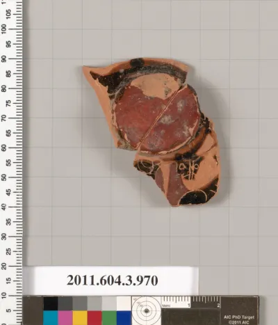 Terracotta fragment of a lekanis lid (covered dish)