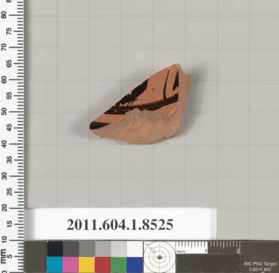 Terracotta fragment of a stemless kylix (drinking cup)