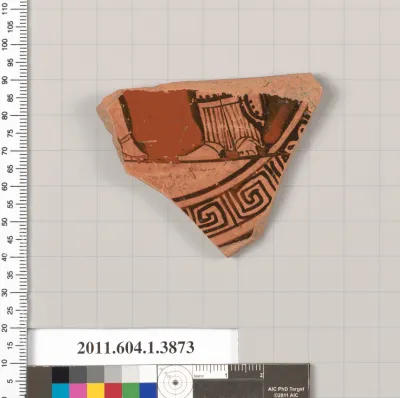 Terracotta fragment of a kylix (drinking cup)