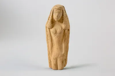 Terracotta statuette of a nude woman
