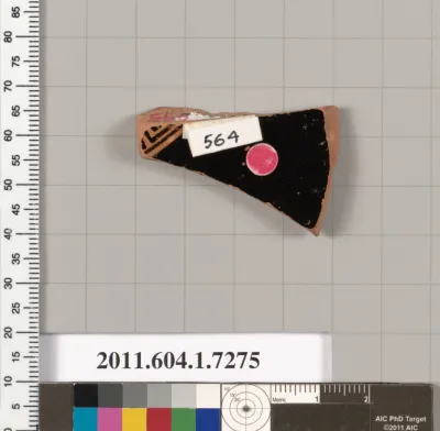 Terracotta fragment of a kylix (drinking cup)