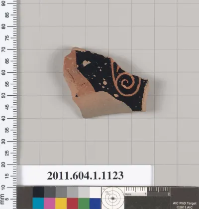 Terracotta fragment of a kylix (drinking cup)