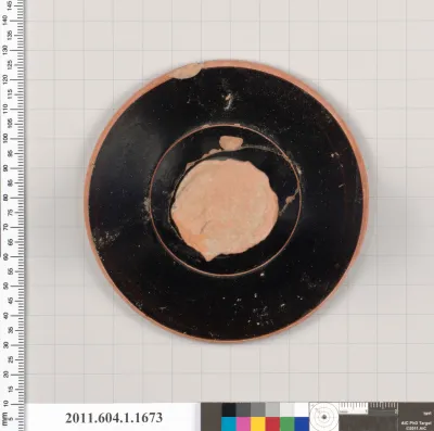 Terracotta fragment of a kylix (drinking cup)
