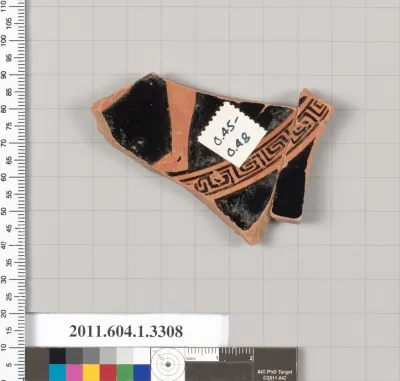 Terracotta fragment of a kylix (drinking cup)