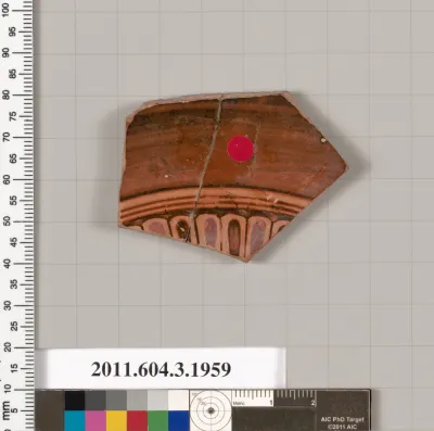 Terracotta fragment of a kylix (drinking cup)