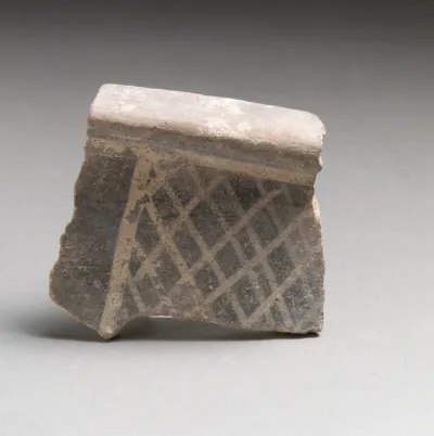 Terracotta rim fragment with cross-hatching
