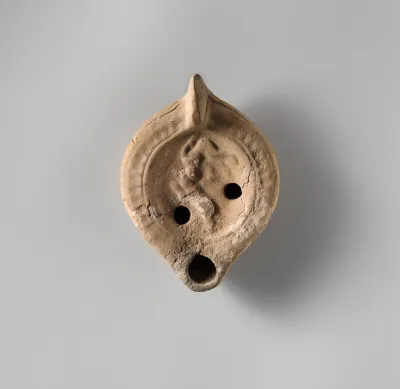 Terracotta oil lamp