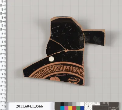 Terracotta fragment of a kylix (drinking cup)