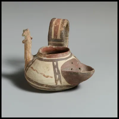 Terracotta one-handled vase with strainer