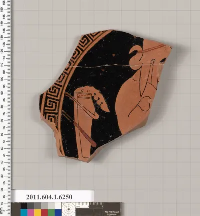 Terracotta fragment of a kylix (drinking cup)