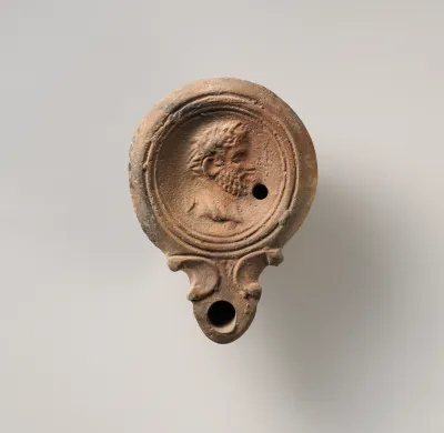 Terracotta oil lamp