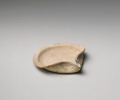 Terracotta saucer-shaped lamp