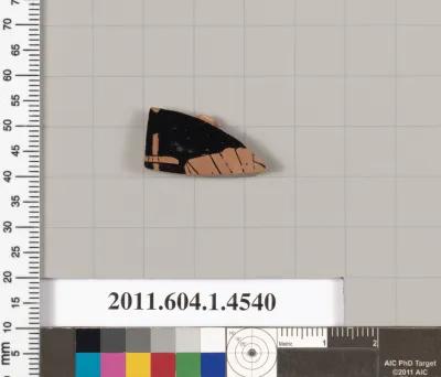 Terracotta fragment of a kylix (drinking cup)