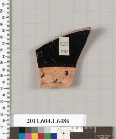 Terracotta fragment of a kylix (drinking cup)