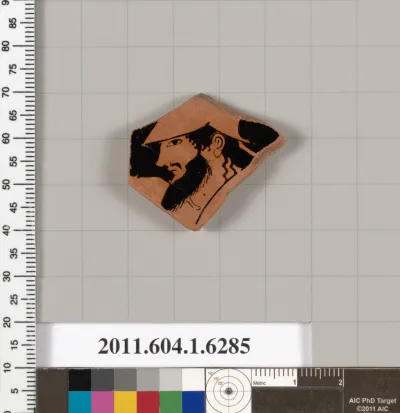 Terracotta fragment of a kylix (drinking cup)