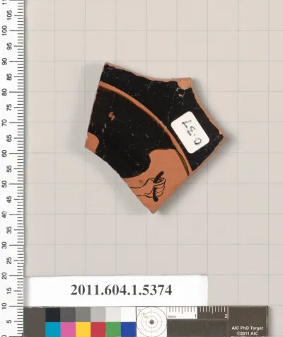 Terracotta fragment of a kylix (drinking cup)