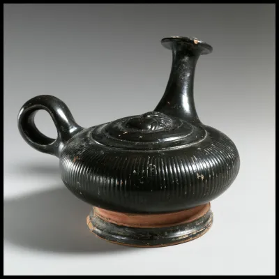 Terracotta guttus (flask with handle and vertical spout)