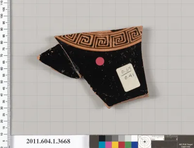 Terracotta fragment of a kylix (drinking cup)