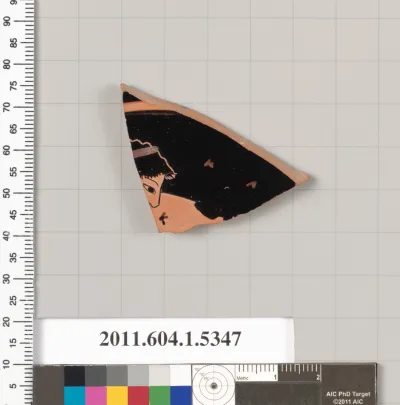 Terracotta fragment of a kylix (drinking cup)