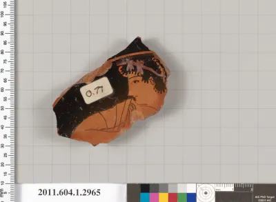 Terracotta fragment of a kylix (drinking cup)