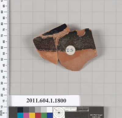 Terracotta rim fragment of a kylix (drinking cup)