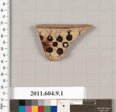 Terracotta fragment of a kylix (drinking cup)