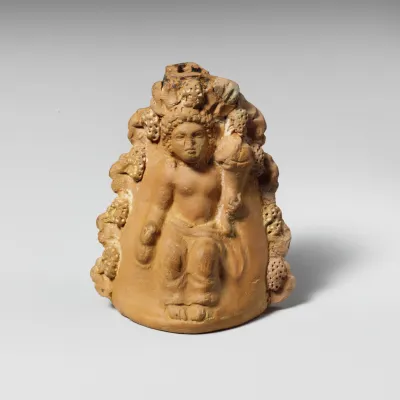 Terracotta oinochoe (jug) with a seated boy