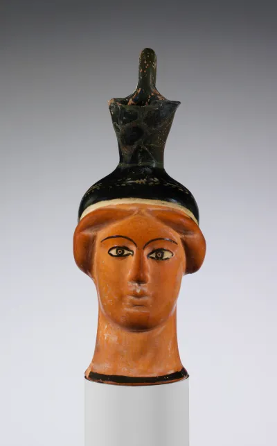 Terracotta oinochoe (jug) in the form of a woman's head