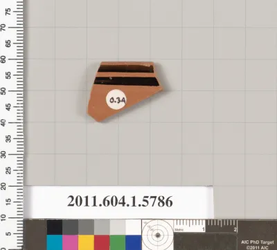 Terracotta rim fragment of a kylix: eye-cup (drinking cup)