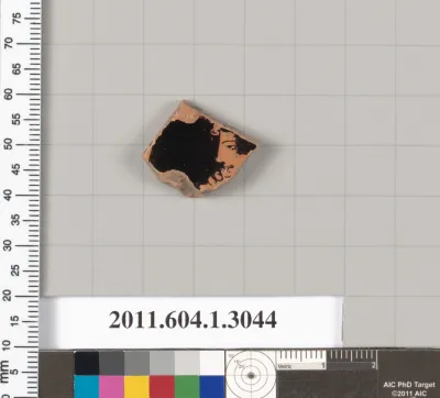 Terracotta fragment of a kylix (drinking cup)