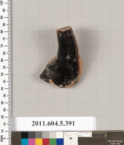 Terracotta fragment of a kylix (drinking cup)