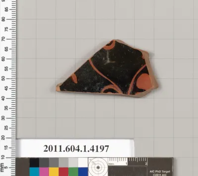 Terracotta fragment of a kylix (drinking cup)