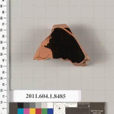 Terracotta fragment of a stemless kylix (drinking cup)