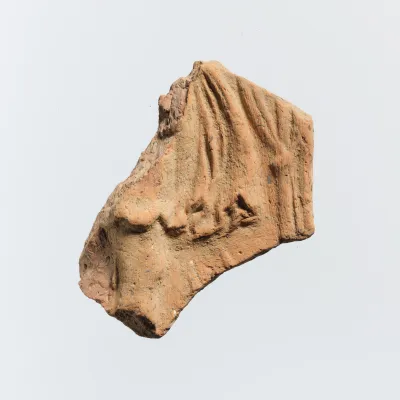 Fragment of a terracotta plaque