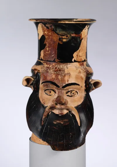 Terracotta mug in the form of a satyr's head