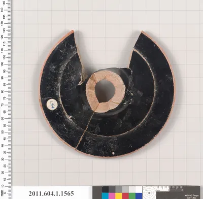 Terracotta fragment of a kylix (drinking cup)