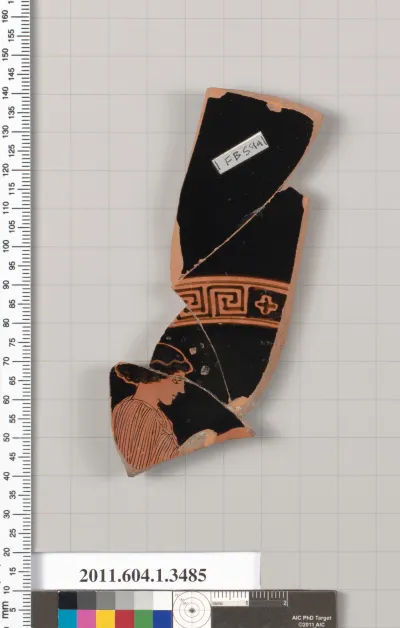 Terracotta fragment of a kylix (drinking cup)