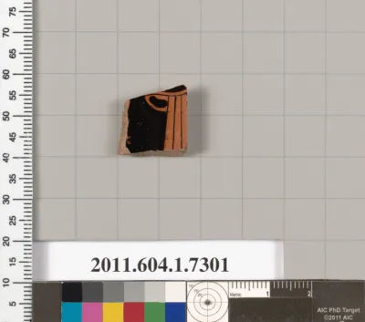 Terracotta fragment of a kylix (drinking cup)