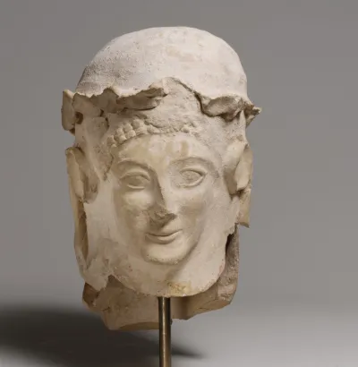 Terracotta head with wreath