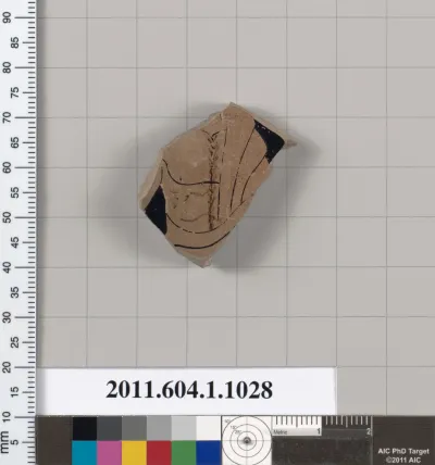 Terracotta fragment of a kylix (drinking cup)