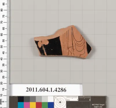 Terracotta fragment of a kylix (drinking cup)