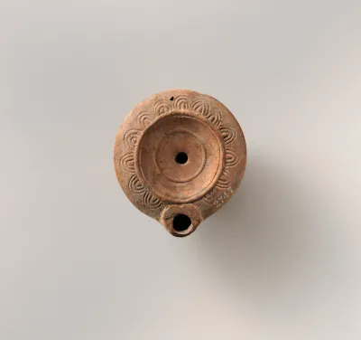 Terracotta oil lamp