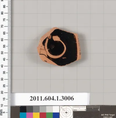 Terracotta fragment of a kylix (drinking cup)