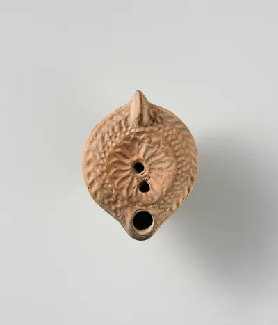 Terracotta oil lamp