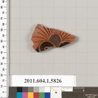 Terracotta fragment of a kylix: eye-cup  (drinking cup)