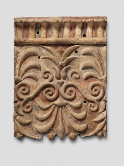 Terracotta architectural plaque with lotus and palmette designs