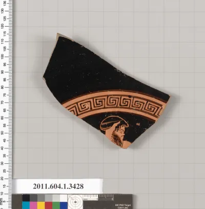 Terracotta fragment of a kylix (drinking cup)