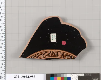 Terracotta fragment of a kylix (drinking cup)